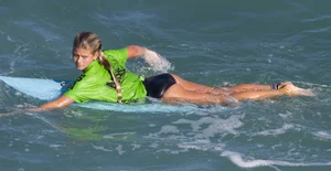 Candid surfer babes on the beach and in bikinis