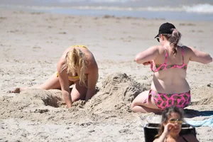 Extra thick beach girls in bikinis with big boobs