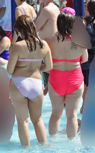 Two thick milfs at the pool in bikinis