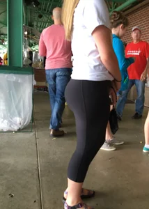 Big booty babe at a baseball game in tight leggings