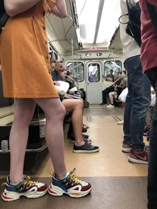 Cute Teen Girl in a Dress With Slim Legs Standing in the Subway Train, Then Crossing the Street Photo Gallery