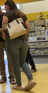 Thick brunette filling out jeans at Lego Store