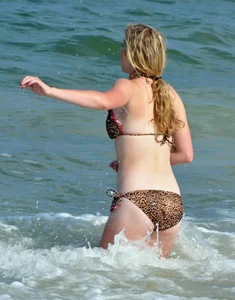 Cheetah print bikini blonde at the beach with nice body
