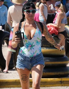 Girls in bikinis getting ready for tubing
