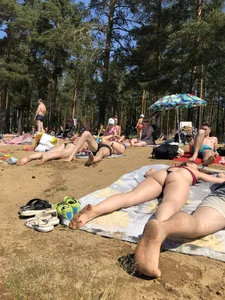 Hot Candid Girl in Swimsuit Lying on the Lake Beach With Spread Legs