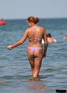 A bunch of sexy beach voyeur babes in bikinis, thongs and topless