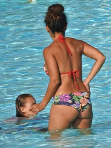 Hot ass milf with an amazing body at the pool