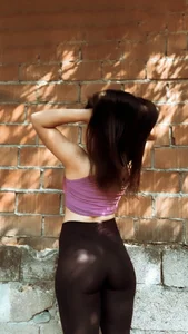 Non-candid hottie in a crop top and leggings