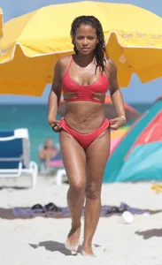 Christina Milian in red bikini in Miami with hard nipples