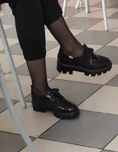 Teen Girl's Feet in Boots And Ankles in Black Pantyhose Under Table Creepshot