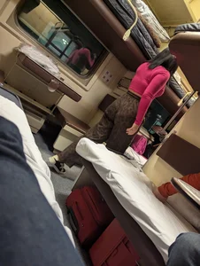 Sleeper train candid girl wearing brown pants bending over