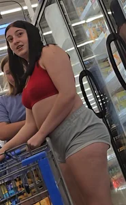 Thickish, nipple-pierced, trashy girl showing her ass for the boys