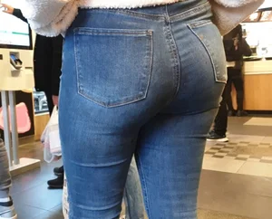 Big tight ass in tight jeans of a blond girl