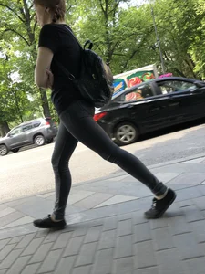 Skinny candid teen wearing tight black jeans walking down the street creepshots