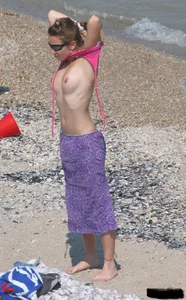 A bunch of sexy beach voyeur babes in bikinis, thongs and topless