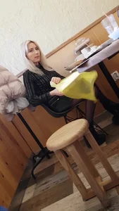 Blonde in Mini Skirt and Black Pantyhose Eating in a Cafe Creepshot - Busted