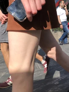 Hot pale legs closeup on the street