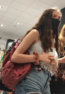 Teen with sexy legs in short jean shorts