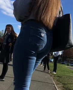 Long haired beauty teen with a tight ass in jeans