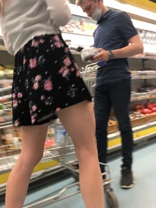 Girl With Amazing Legs on Hight Heeled Sandals at the Supermarket Closeup Photos