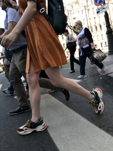 Cute Teen Girl in a Dress With Slim Legs Standing in the Subway Train, Then Crossing the Street Photo Gallery