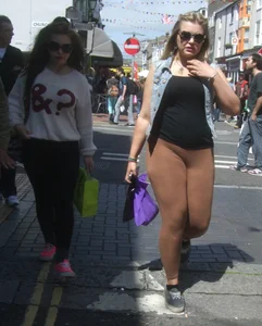 Thick blonde showing her panties in see through leggings
