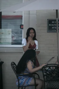 Two sexy Tilted Kilt employees showing cleavage and cheeks