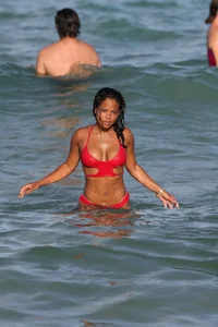Christina Milian in red bikini in Miami with hard nipples
