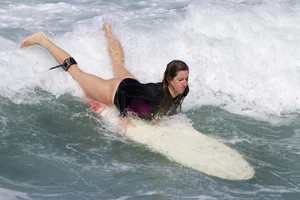 Candid surfer babes on the beach and in bikinis