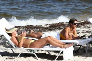 Frankie Bridge nip slips in a bikini on the beach