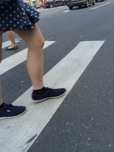 Girl in Polka-Dot Skirt with Pale Legs Crossing the Street City Candid