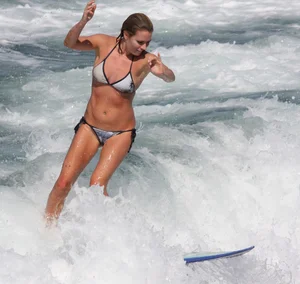 Candid surfer babes on the beach and in bikinis