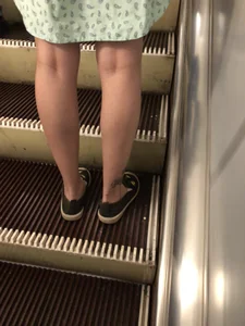 Girl in a Dress With Sexy Legs in Subway and on a Street