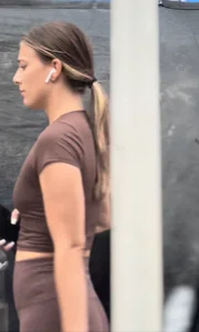 Sporty teen in brown tight yoga pants