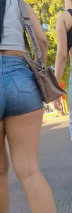 super sexy denim short shorts on this brunette with tremendous legs and big butt