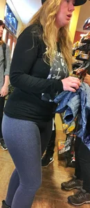 PAWG blonde in grey leggings while shopping