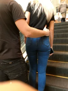 Blonde with a Nice Booty in Jeans with Her Boyfriend on the Mall Escalator Creepshots