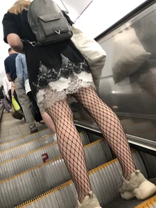 Cute Girl in Lacey Semi-Transparent Dress and Fishnet Pantyhose Subway Escalator Candid Photos Gallery