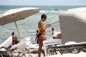 Frankie Bridge nip slips in a bikini on the beach