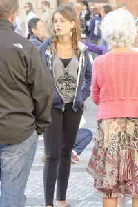 Pretty curly haired girl in tight leggings