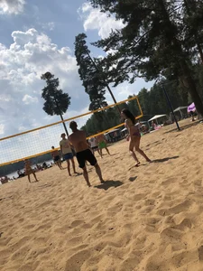 Swimsuit Candid Girl Playing Volleyball at a Beach Gallery