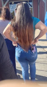 Tight denim jeans ,she pulls them up tighter for me. Latina Honduran for sure..