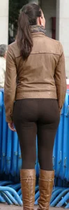 Brunette babe with a nice ass in tight brown leggings