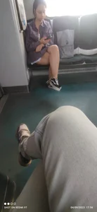Cute candid girl with nice legs sitting with crossed legs in a public bus creepshots