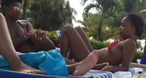 Black friends at the pool in bikinis