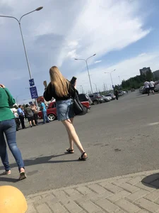 Nice candid girl in a jean skirt with hot legs