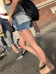 Girl in Denim Mini Shorts and Sandals With Sexy Legs And Feet Street and Subway Photos