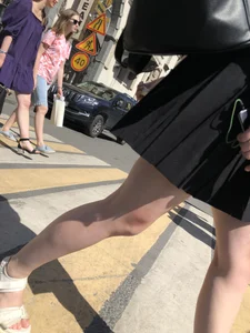 Legs of a hot candid girl on a crosswalk