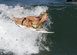 Candid surfer babes on the beach and in bikinis