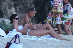 Iris Mittenaere in a white thong bikini on the beach in St Martin